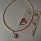Minimalist freshwater pearl and rose quartz charm necklace