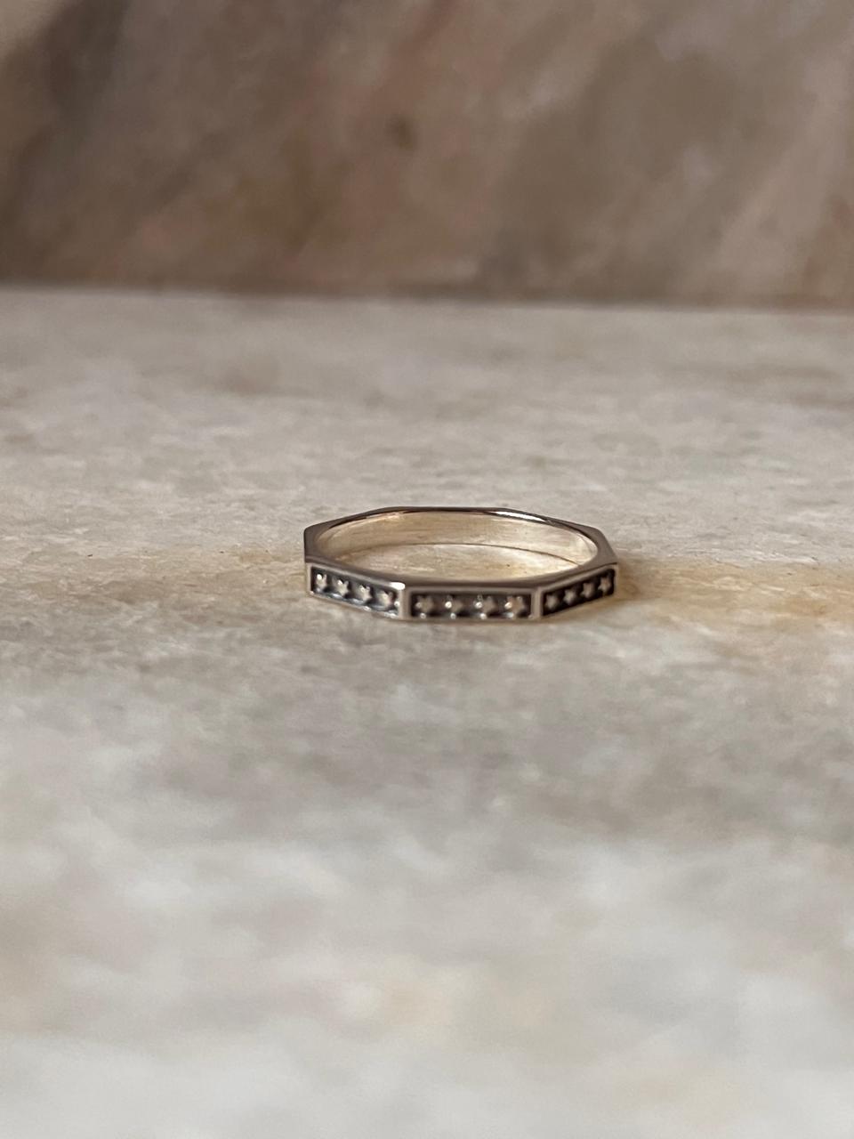 Sterling silver ring with star and hexagon design  