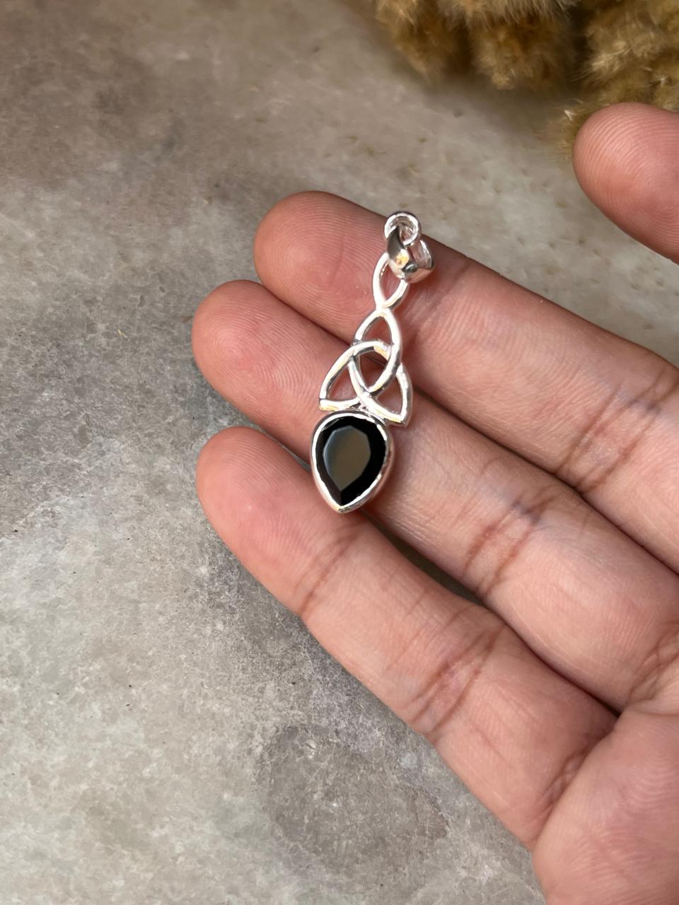 Elegant Trinity Knot Pendant with Black Onyx in Sterling Silver  