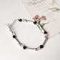 Fashionable Sterling Silver Bracelet with Rose Quartz and Black Onyx
