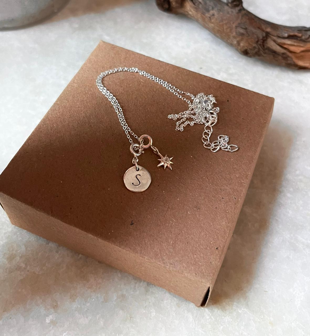 925 sterling silver necklace with white topaz north star and initial charm