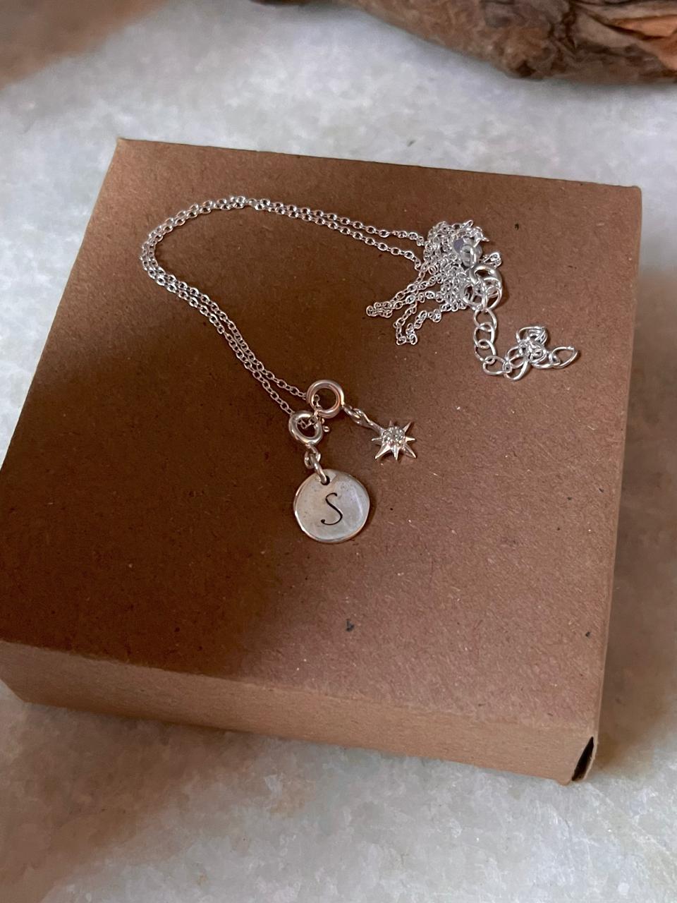 White topaz north star pendant with engraved initial sterling silver necklace