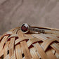 Artisan garnet solitaire silver ring with intricate vintage band