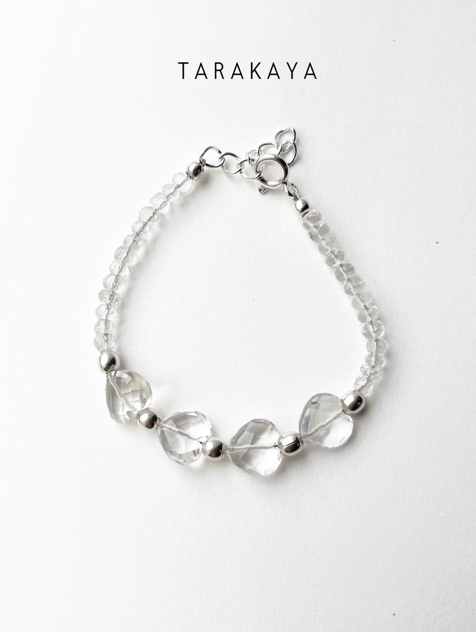 Heart-shaped clear quartz crystal bracelet with silver beads  