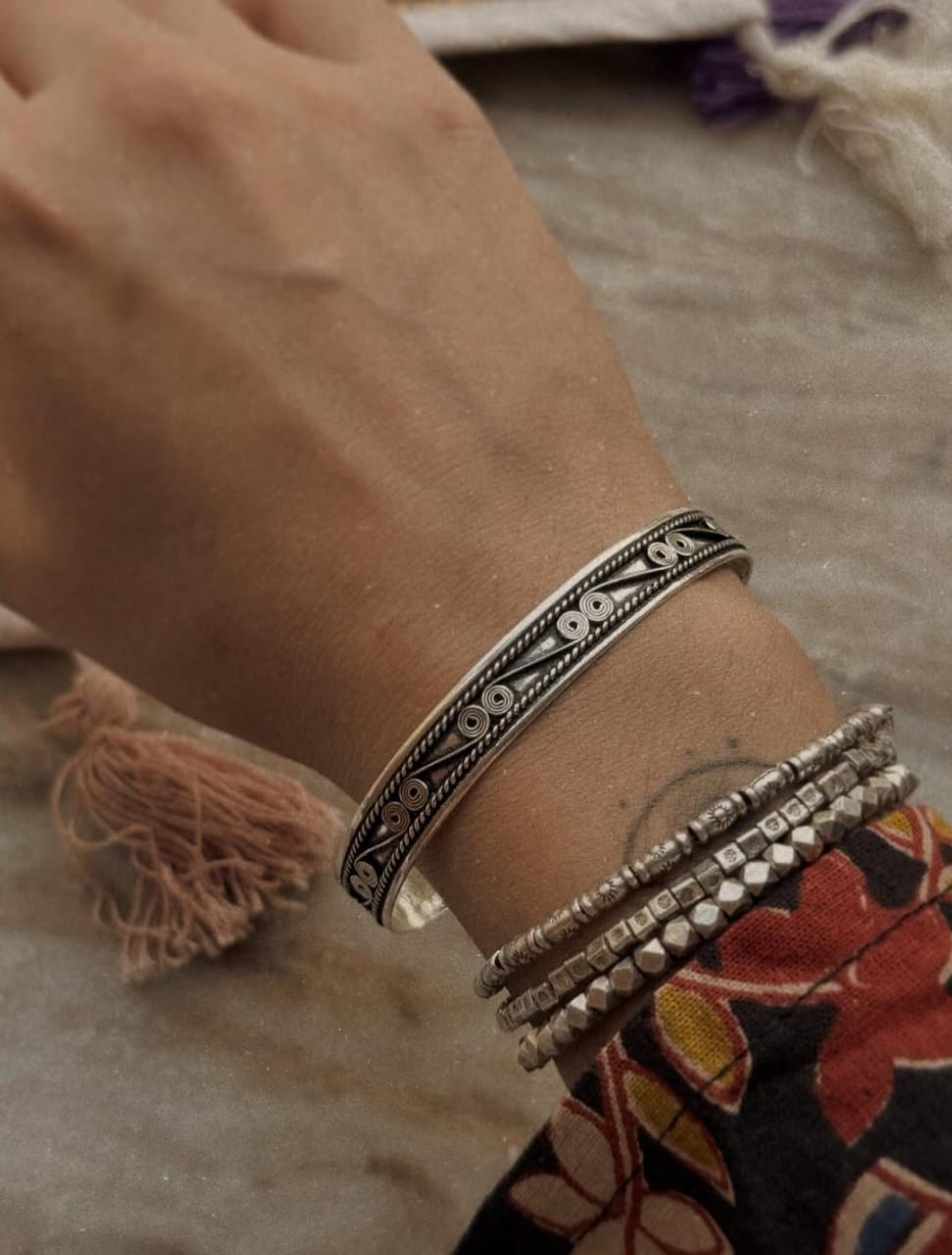 Handcrafted oxidised silver cuff with spiral rope twist design  