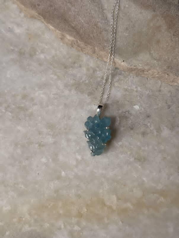 Forest-inspired aquamarine charm pendant handcrafted in silver