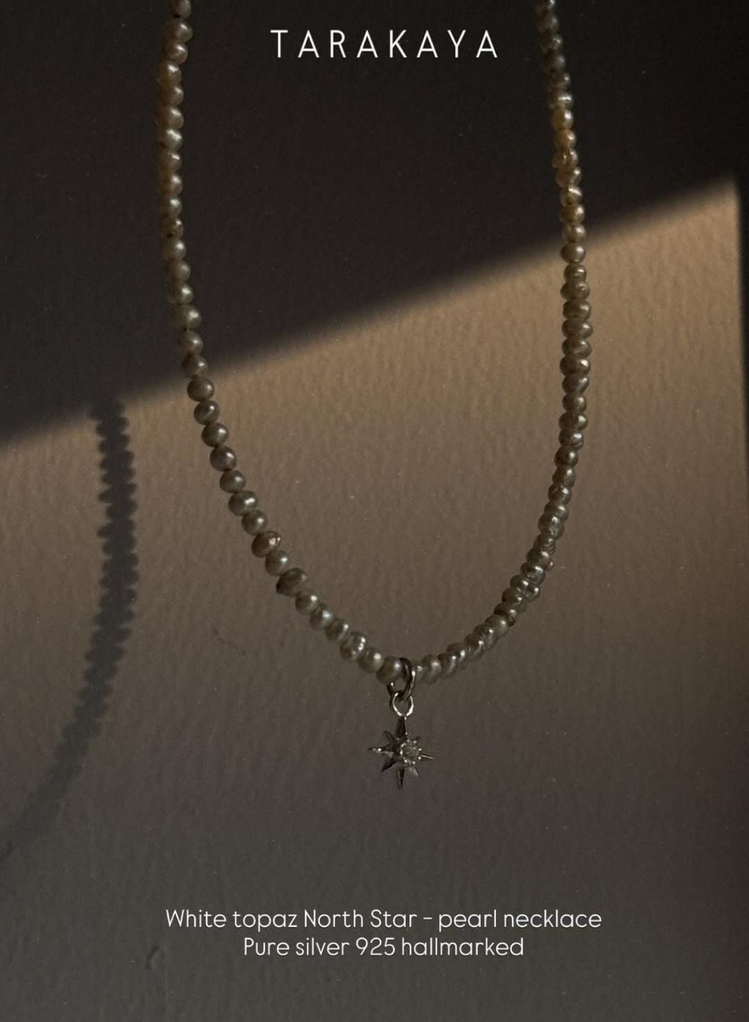 925 Sterling Silver Warm Tone Pearl and Topaz North Star Necklace close-up  