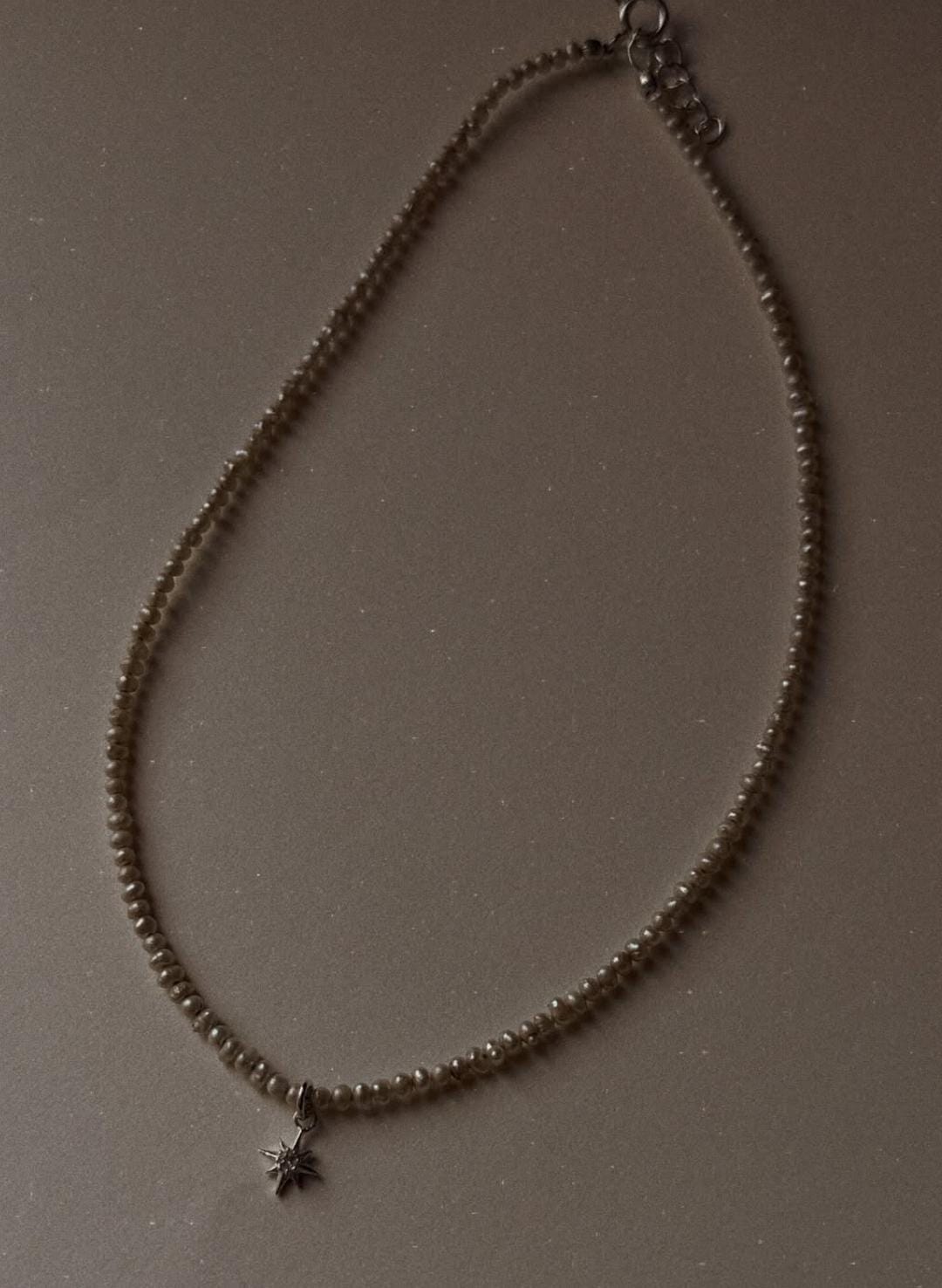 Elegant 925 Sterling Silver North Star Necklace with Warm Tone Pearl and Topaz